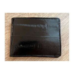 NWOT. Genuine eel skin card holder.
